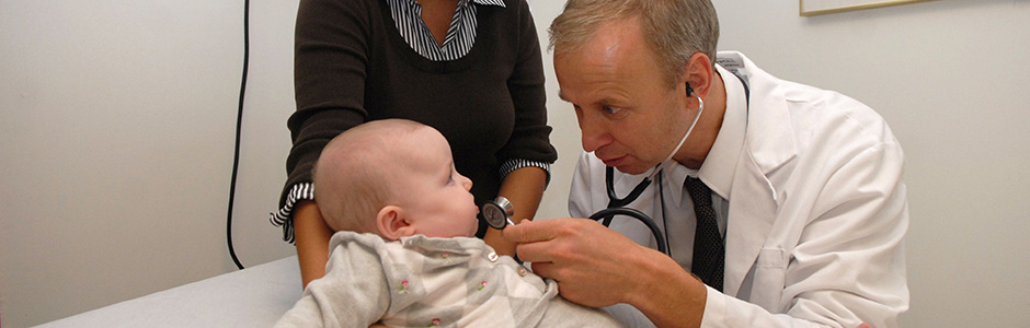 A Weill Cornell Medicine provider interacts with a pediatric patient.