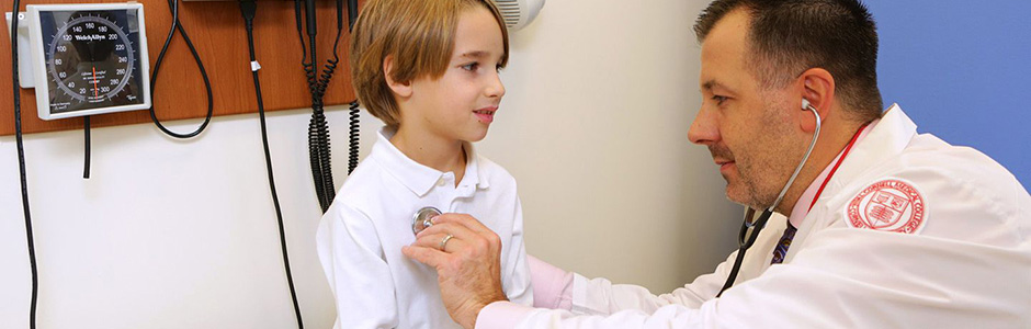 Dr. Thomas Ciecierega with a patient