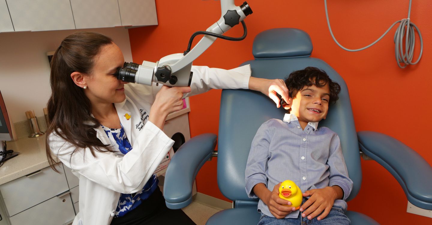 Young male patient interacting with ENT provider