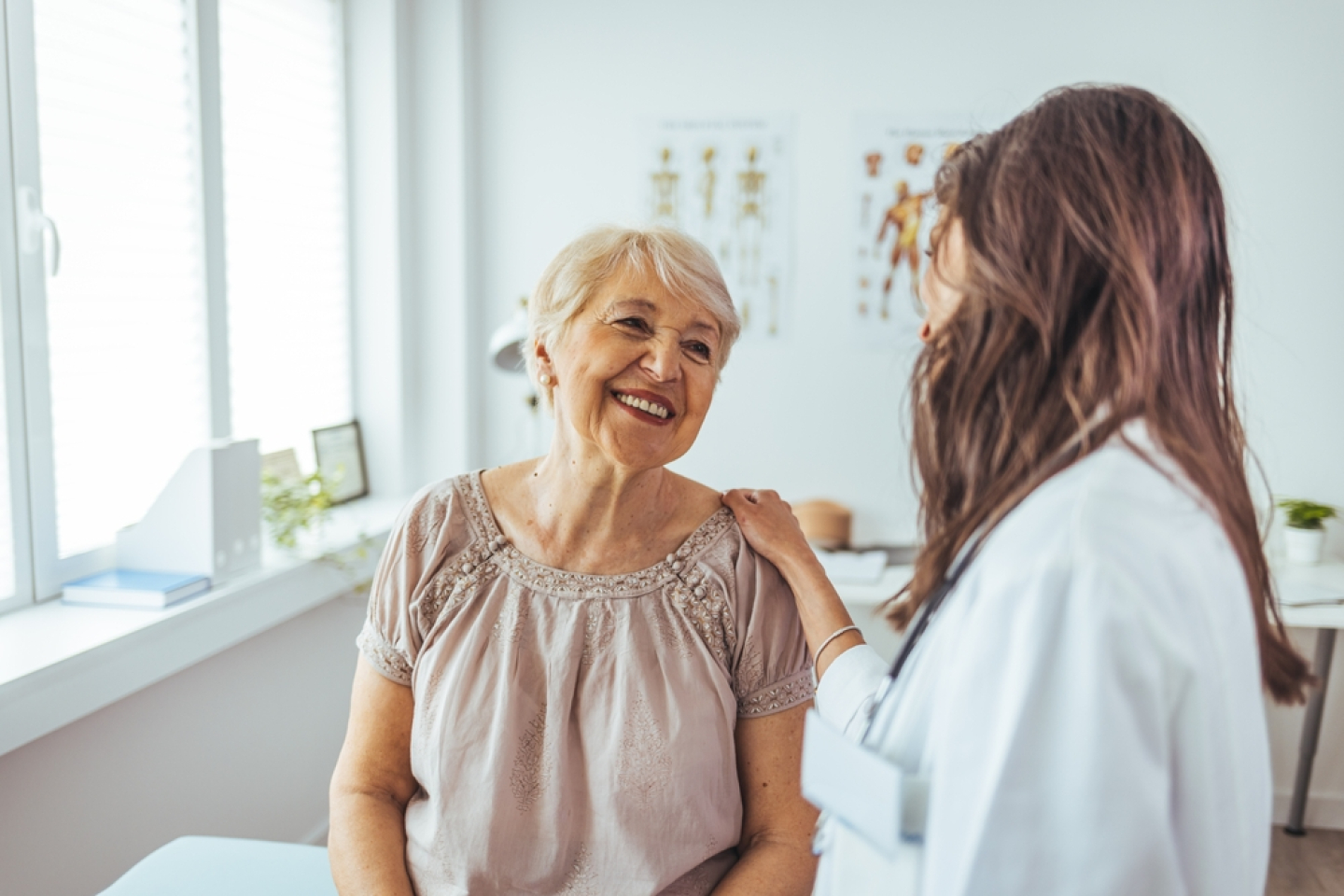 women and doctor talking