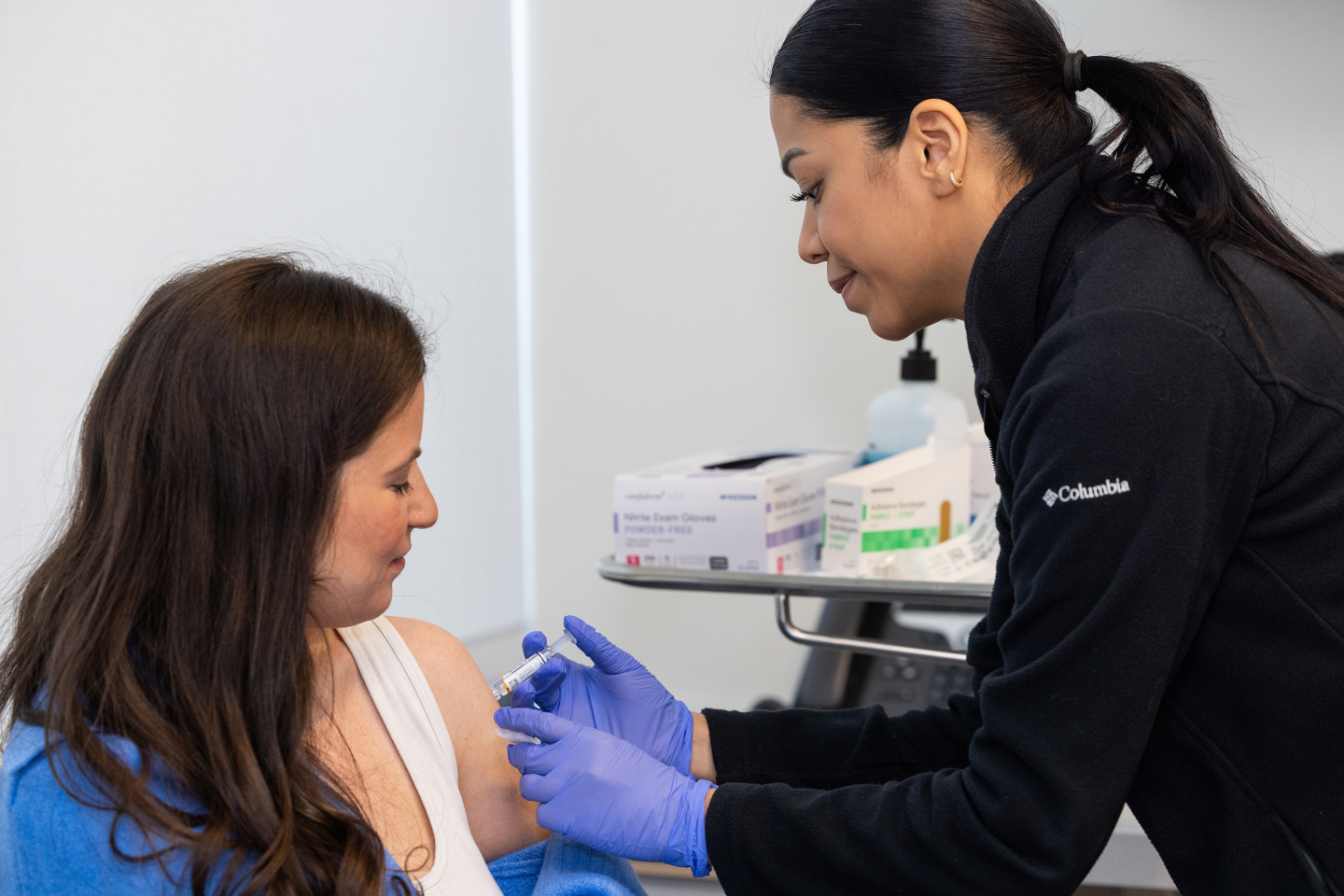 a patient getting vaccinated