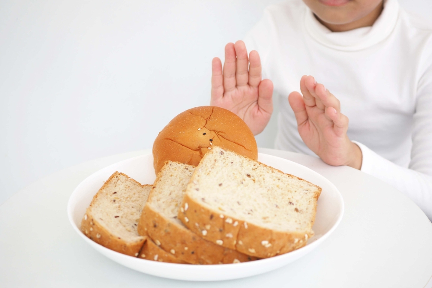 kid saying no to bread