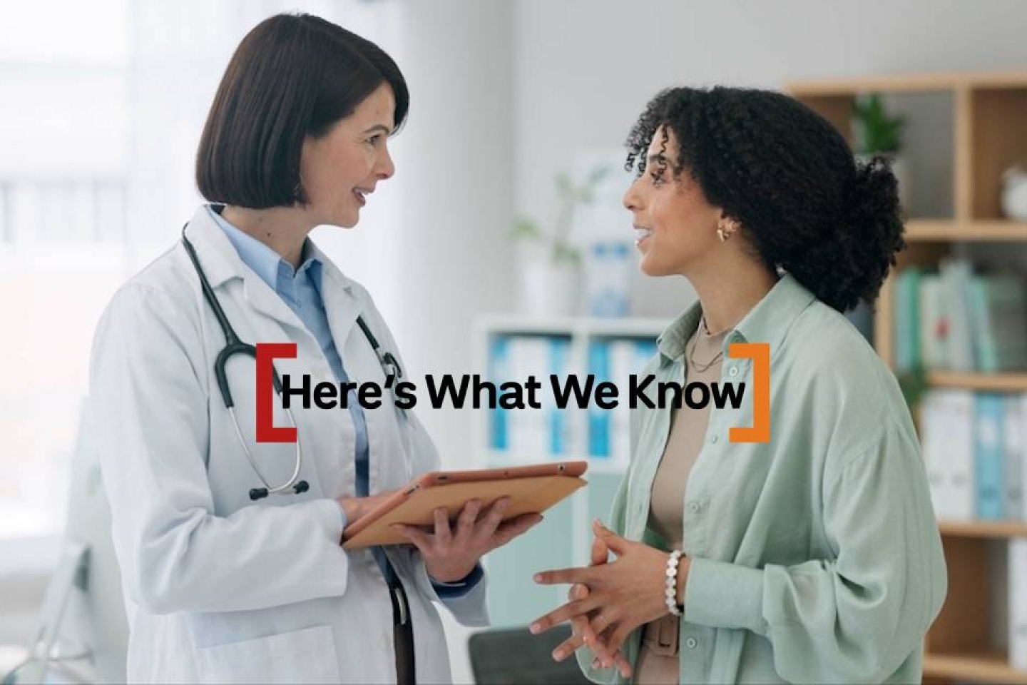 woman speaking with her doctor