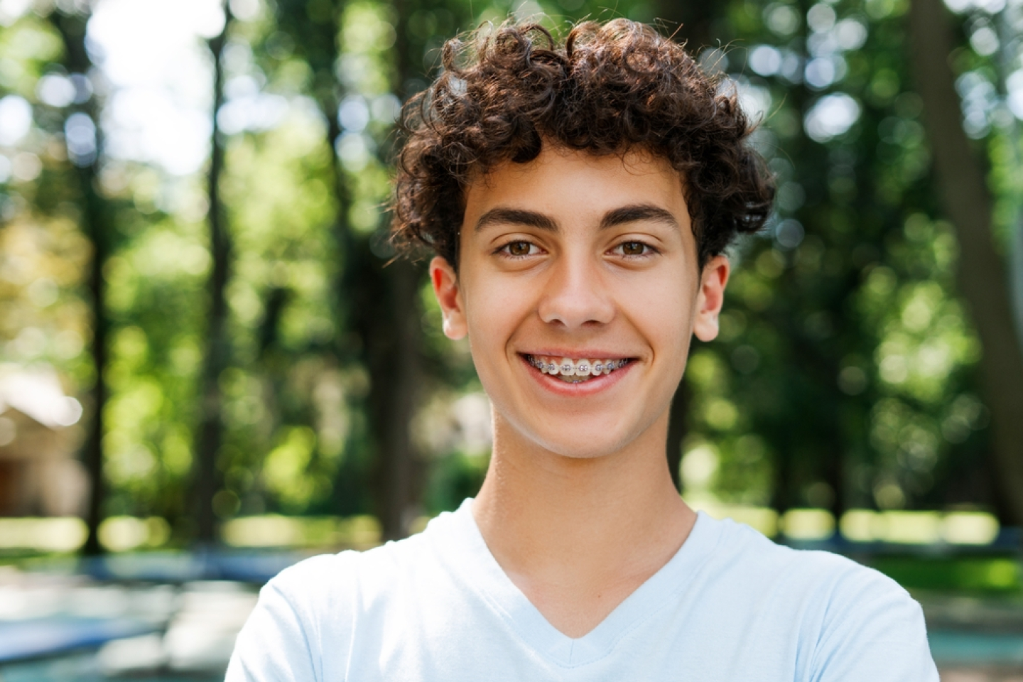 A young boy smiling