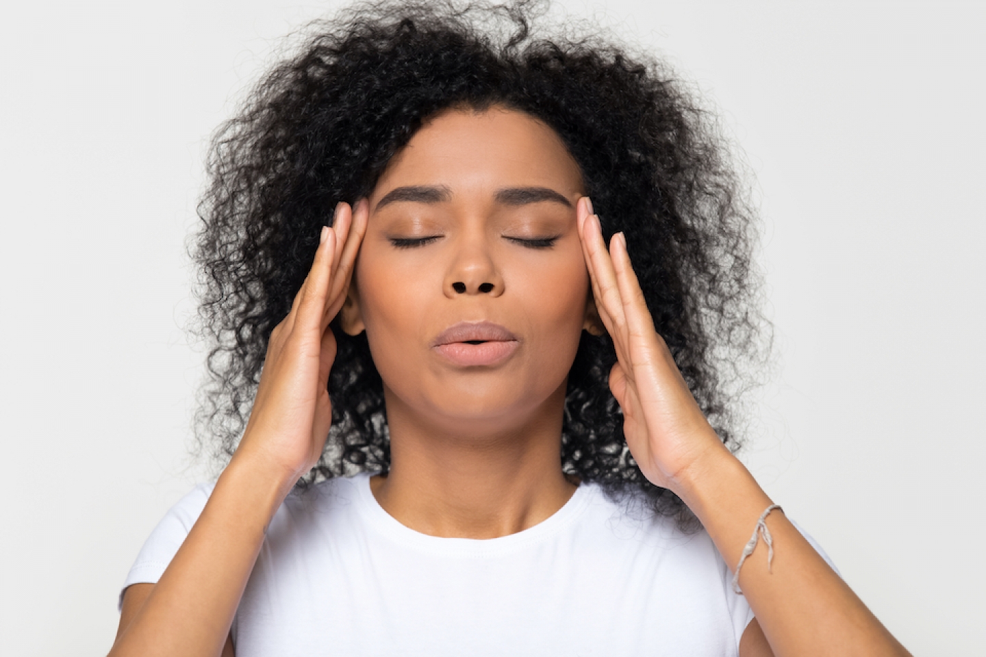 black woman with a headache