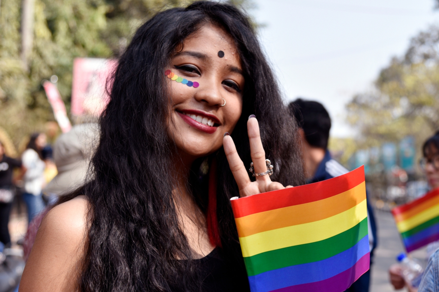 supporter of the lesbian, gay, bisexual, transgender (LGBT) community take part in a pride parade