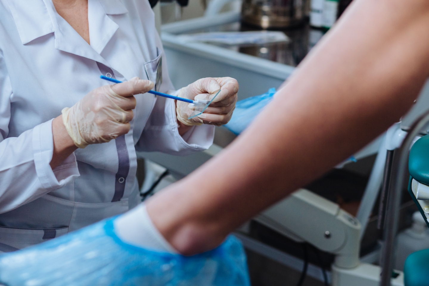 doctor performing pap smear