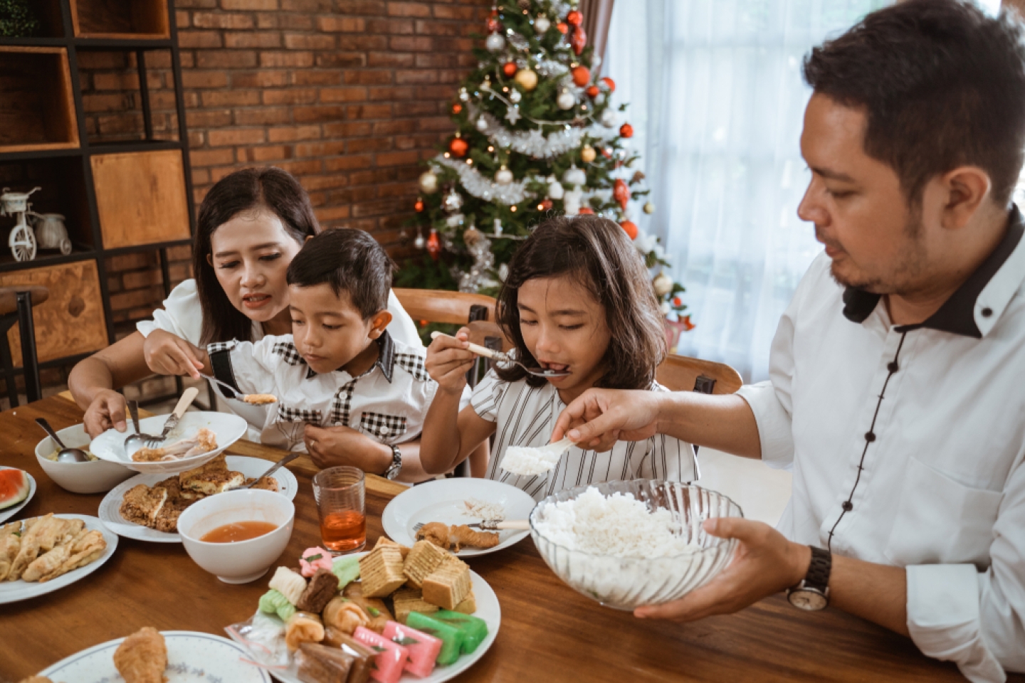 lunch with family on christmas day together in dining room