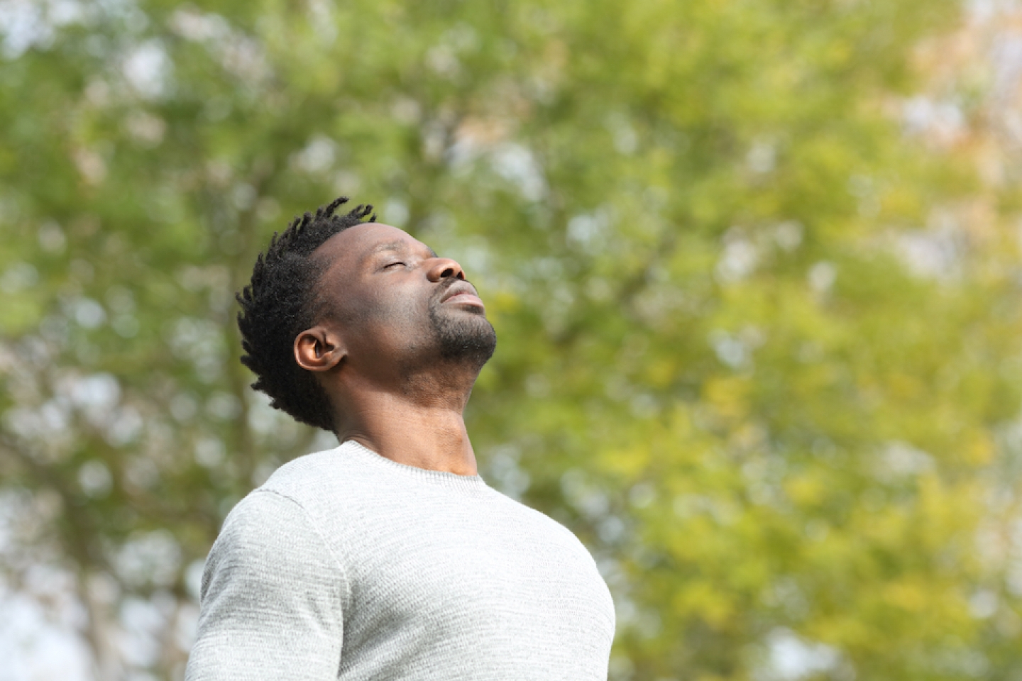 man breathing outside