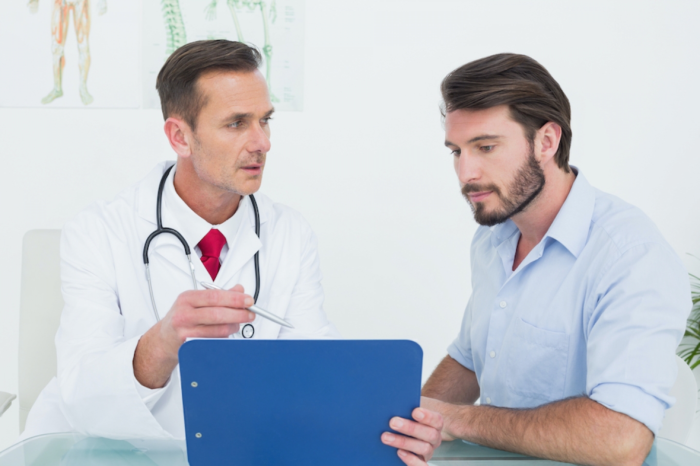 doctor meets with patient