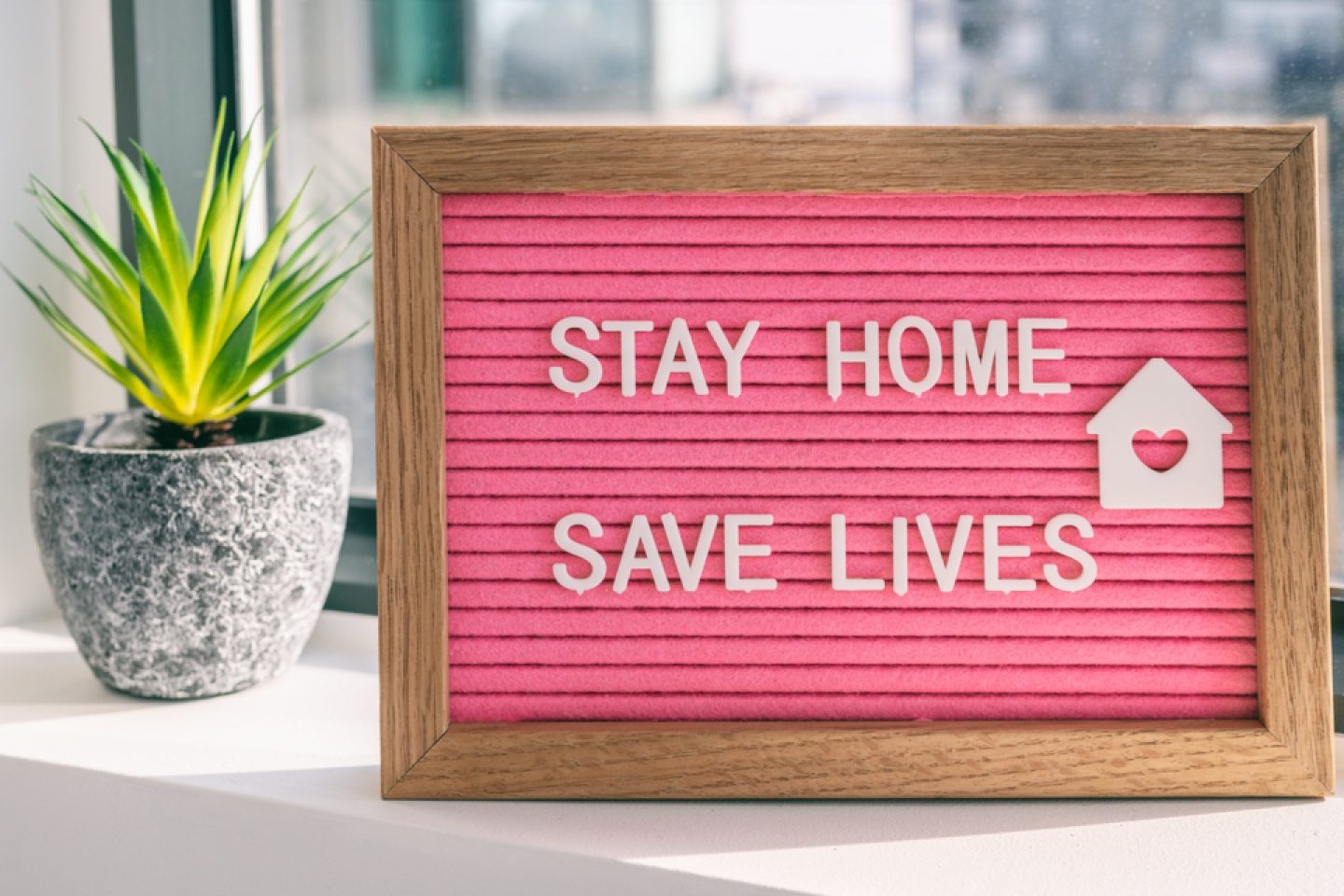 COVID-19 Coronavirus "STAY HOME SAVE LIVES" viral social media message sign with text for social distancing awareness. COVID-19 staying at home concept. Flatten the curve.