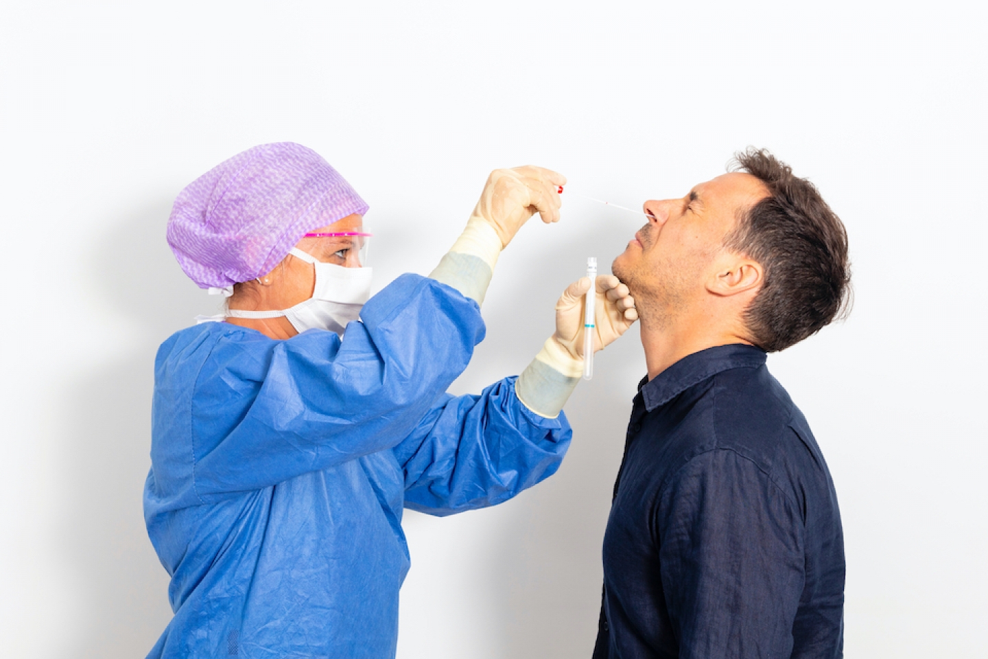 man receiving a covid test