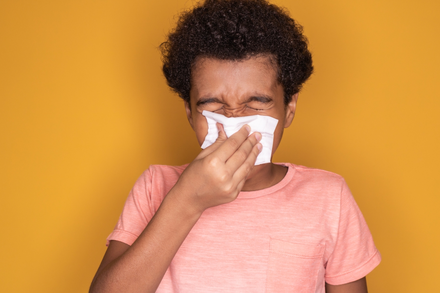 Sick child with napkin