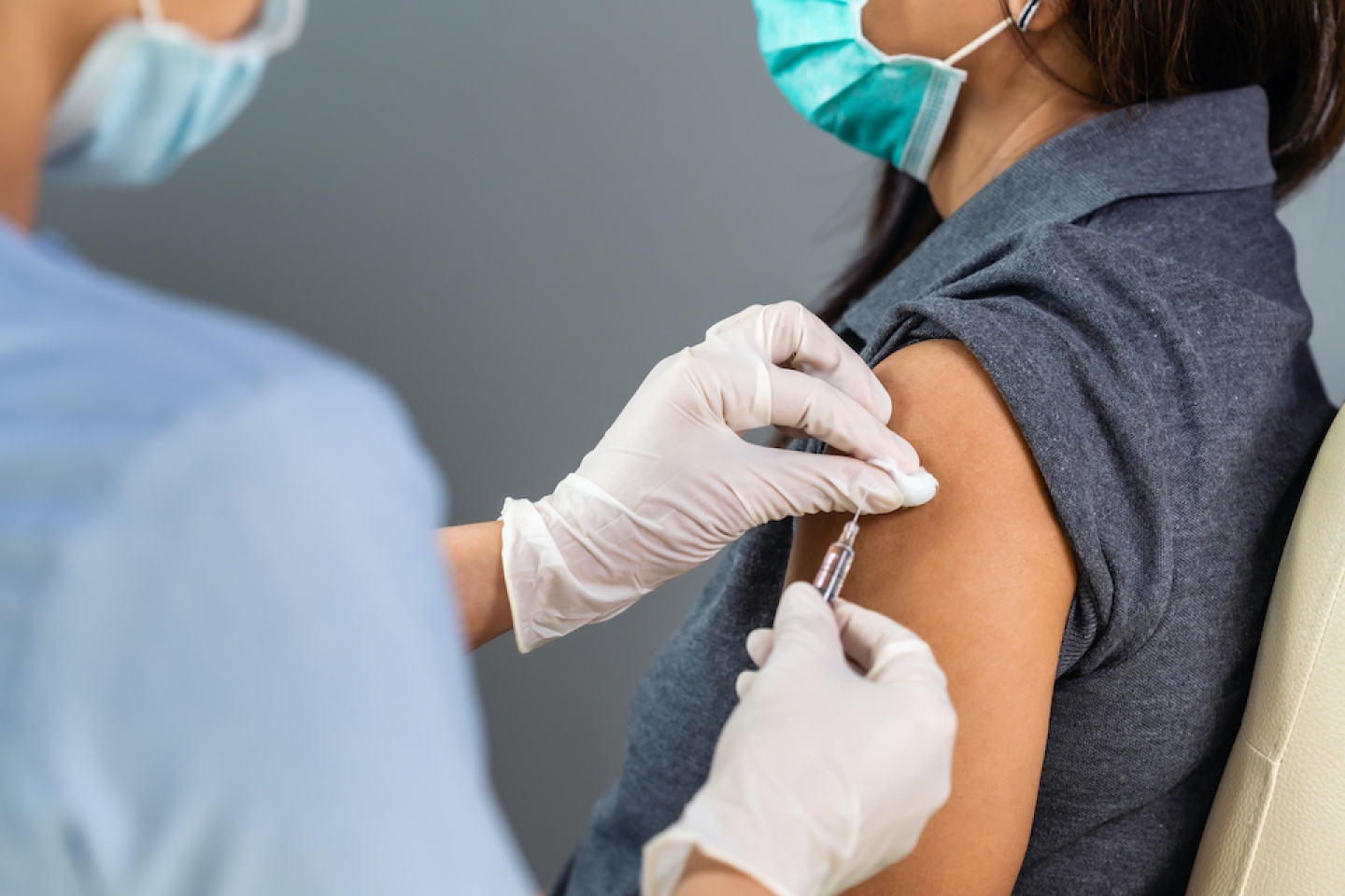 patient receiving a vaccine shot