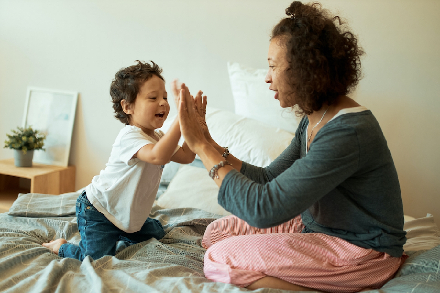 happy child playing with mom