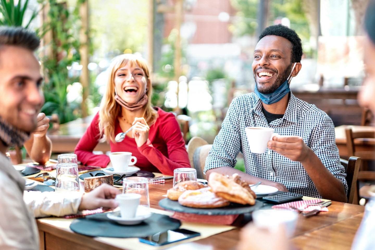 groups of friends having outdoor brunch 