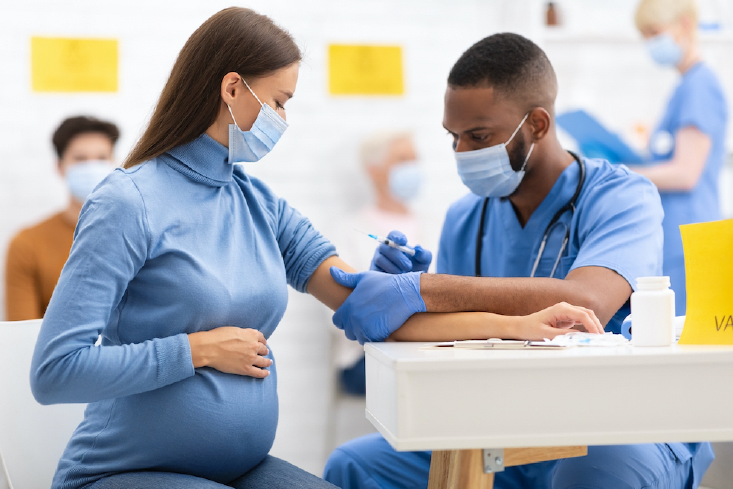 pregnant parent getting the vaccine