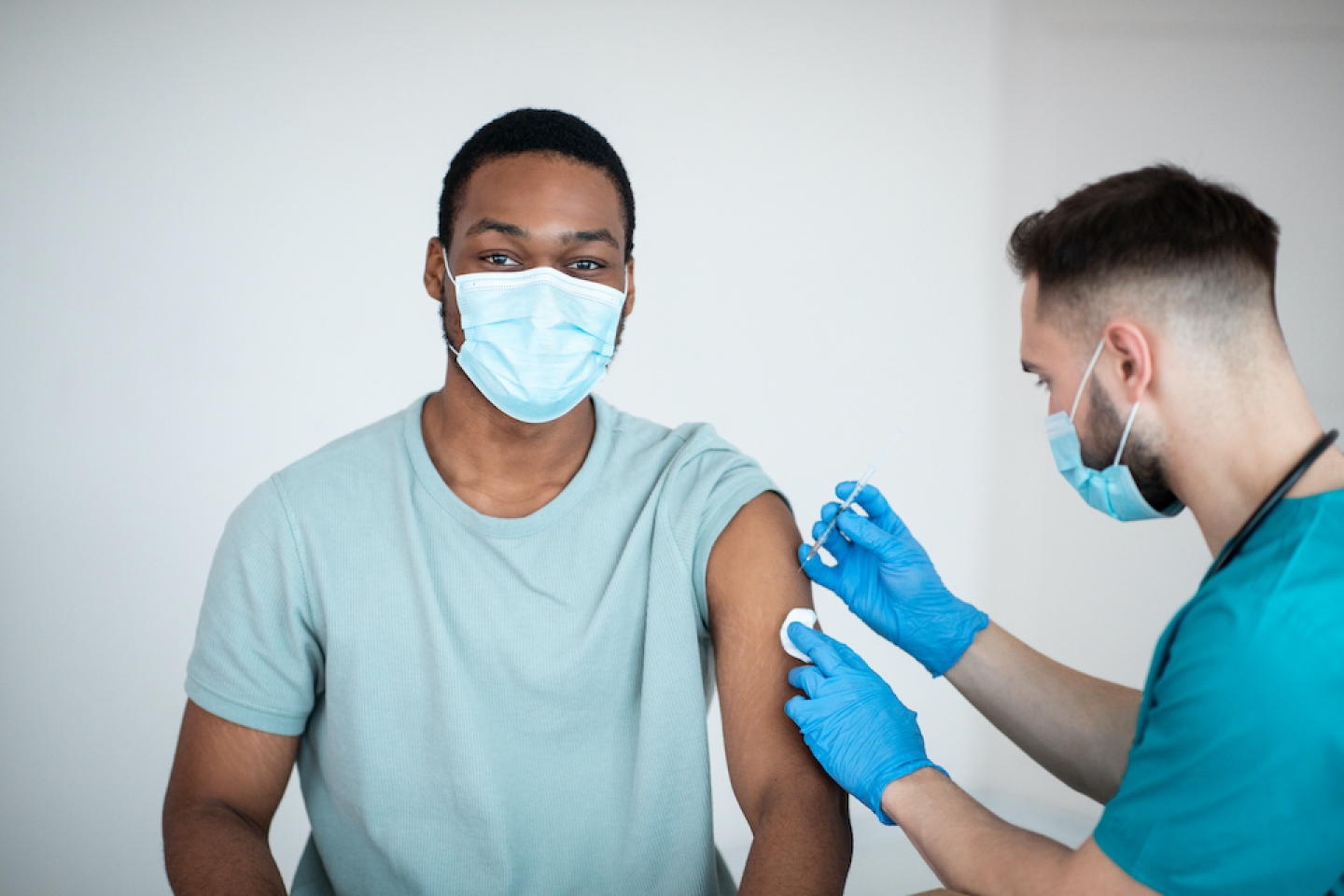 black male patient gets vaccinated