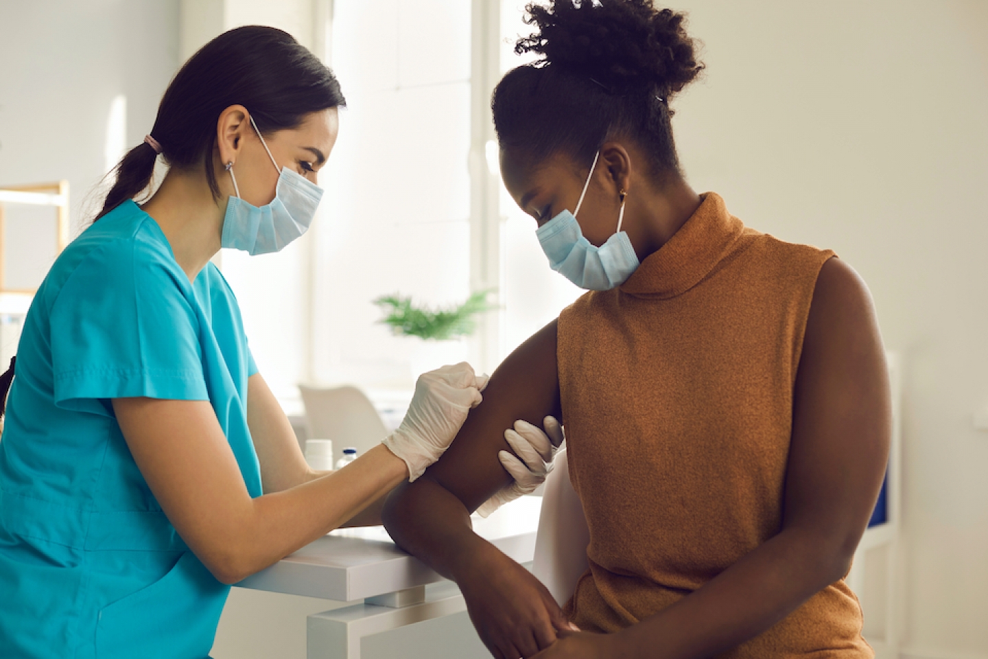 patient receiving covid vaccine