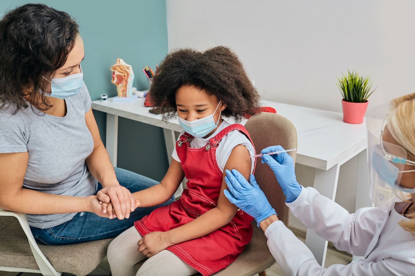 child receives vaccine