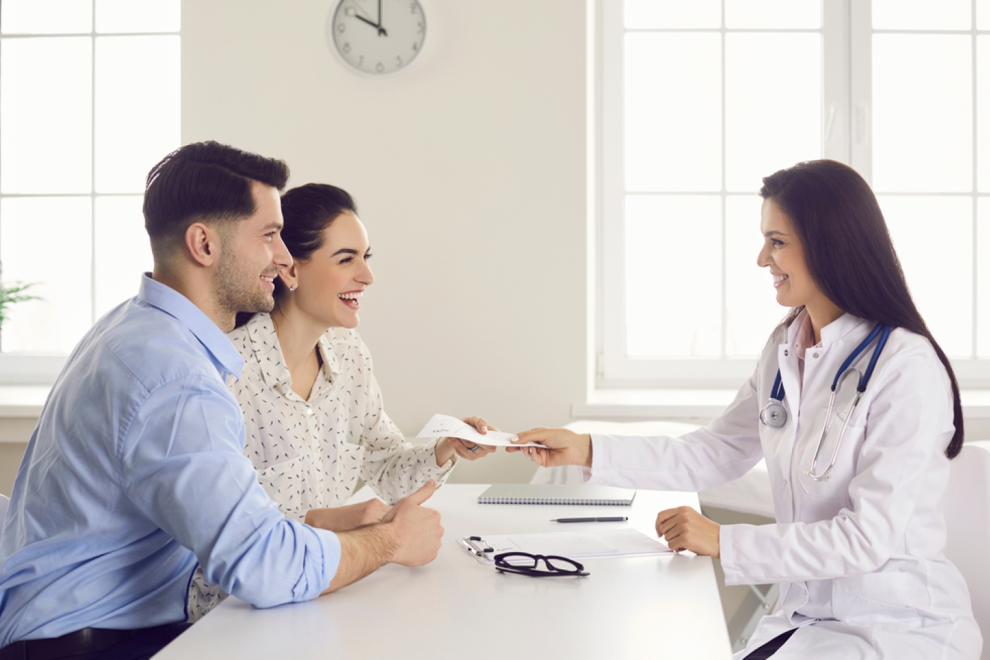 Consulting family doctor at clinic.