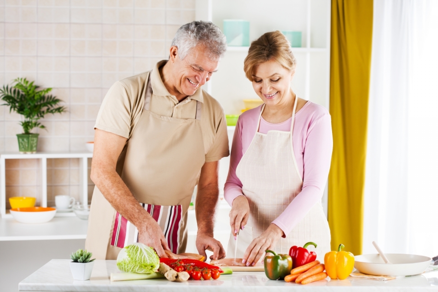 older couple cooking