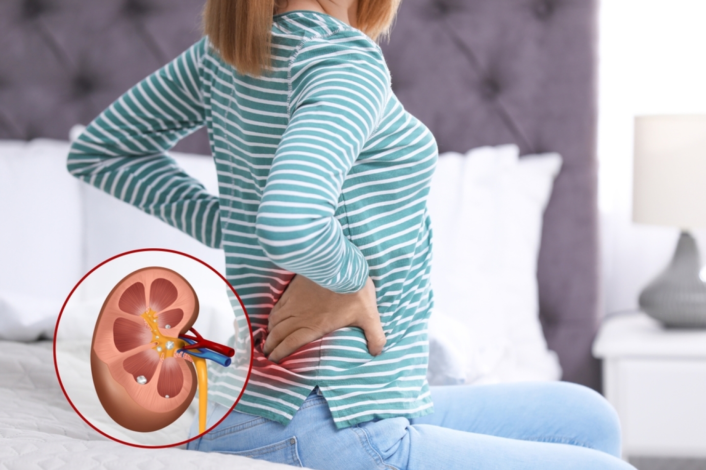 Woman suffering from pain because of kidney stones disease at home
