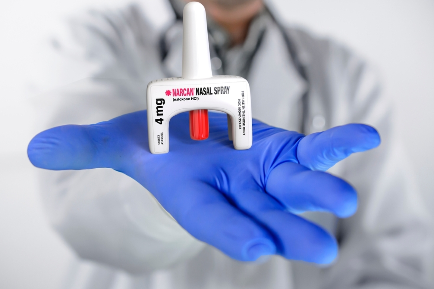 Doctor holds Naloxone spray in hand. Food and Drug Administration approved spray form of Naloxone.