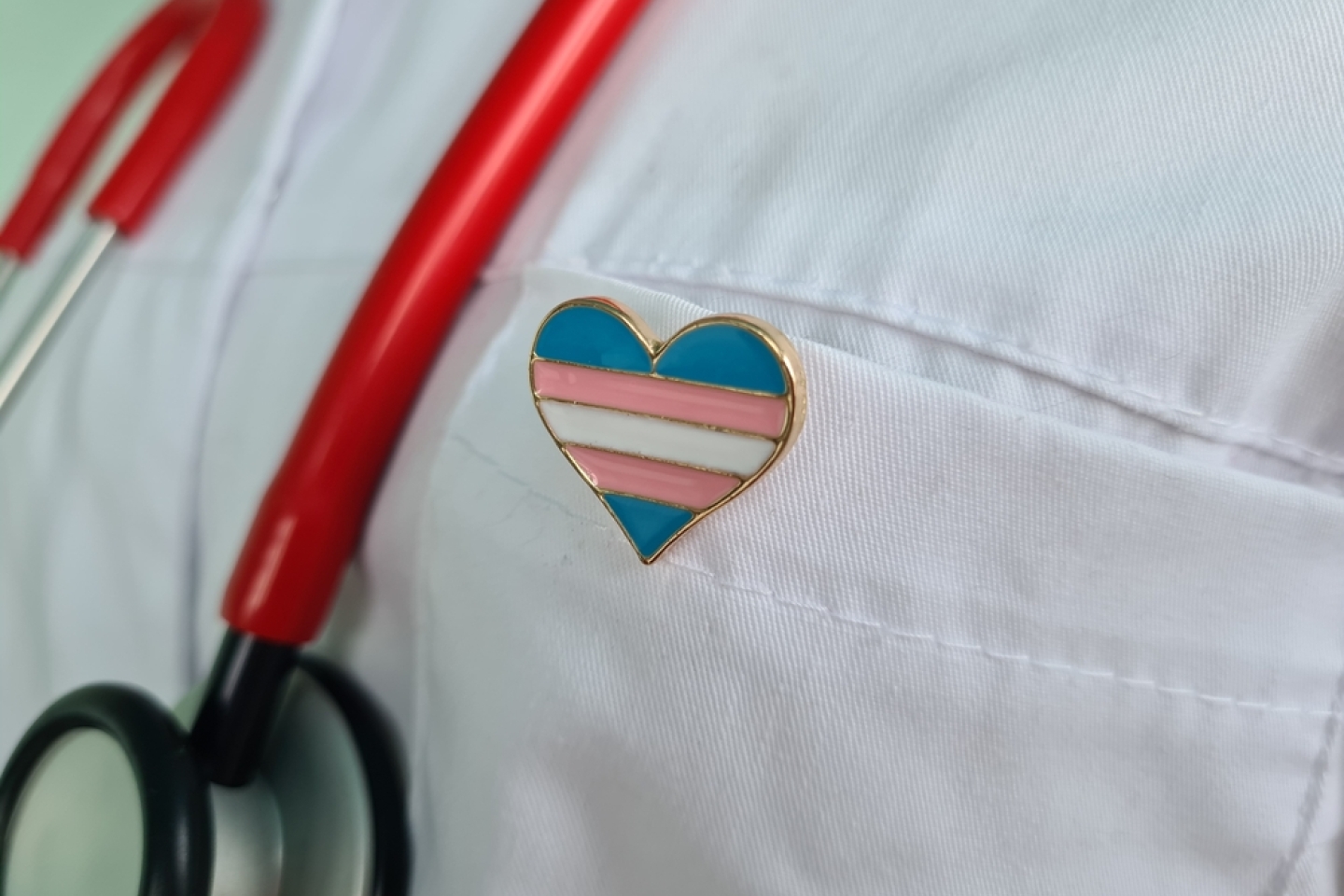 Transgender LGBT symbol stethoscope with rainbow icon for rights and gender equality. Medical care insurance and doctor
