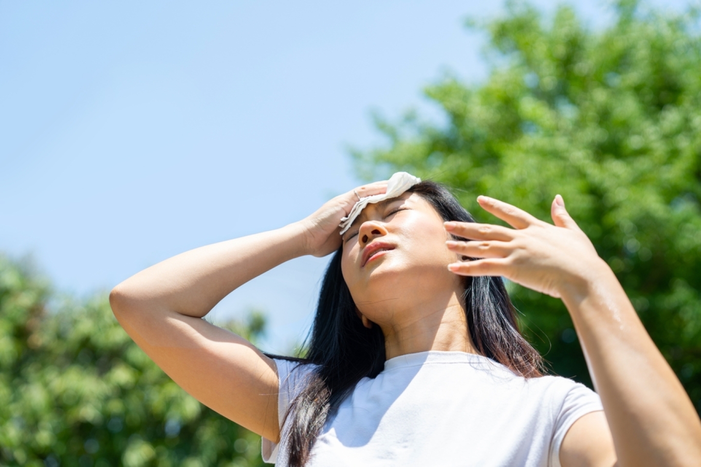 Front view portrait of a stressed teen suffering heat stroke