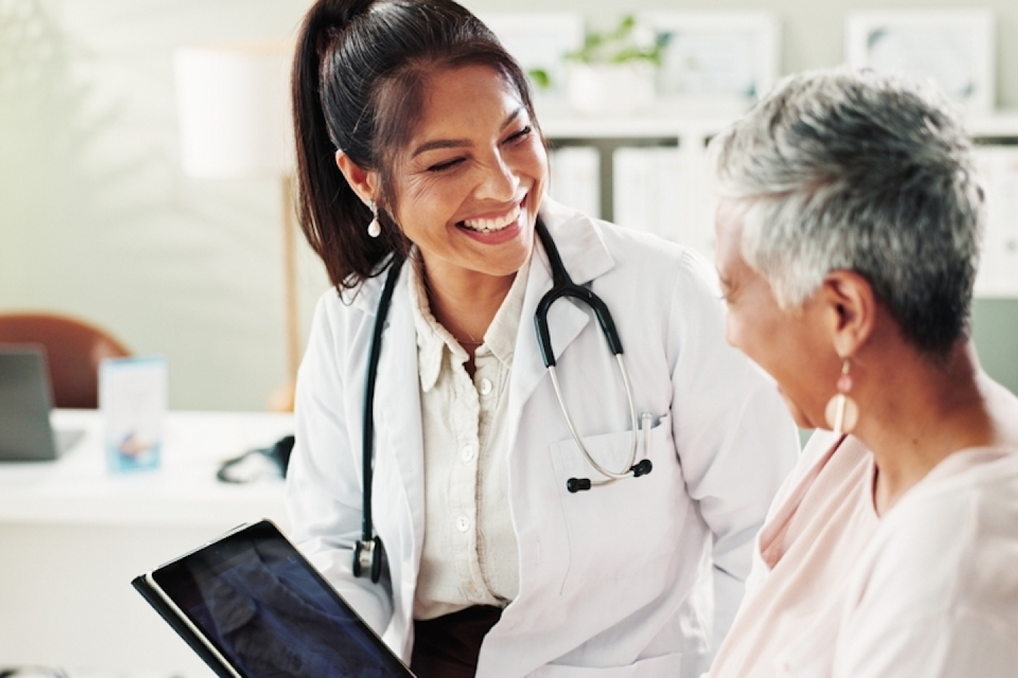 woman speaking with her doctor