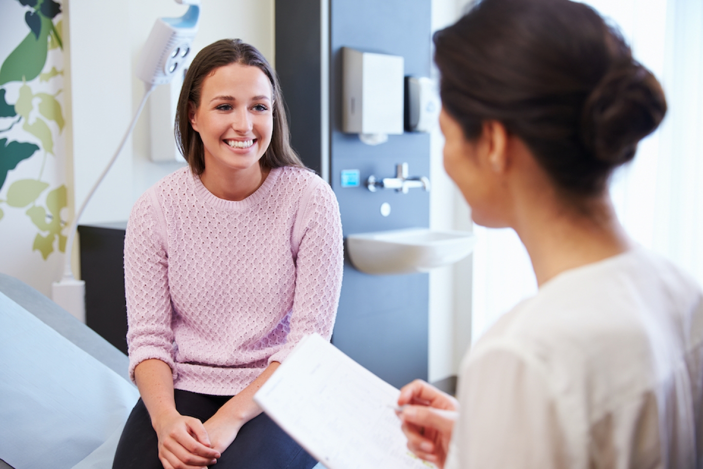 woman seeing her doctor