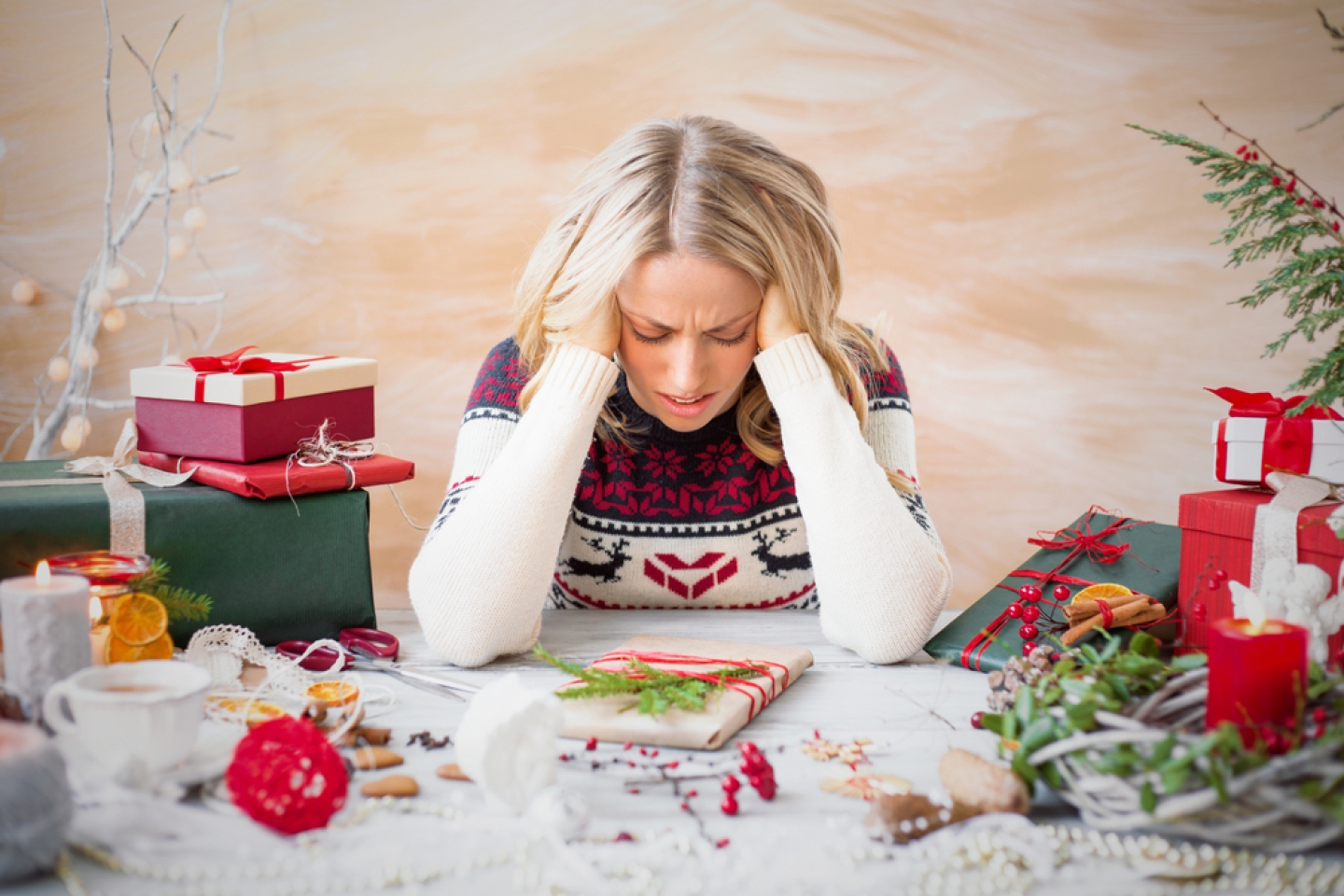 Woman depressed with Christmas gift clutter