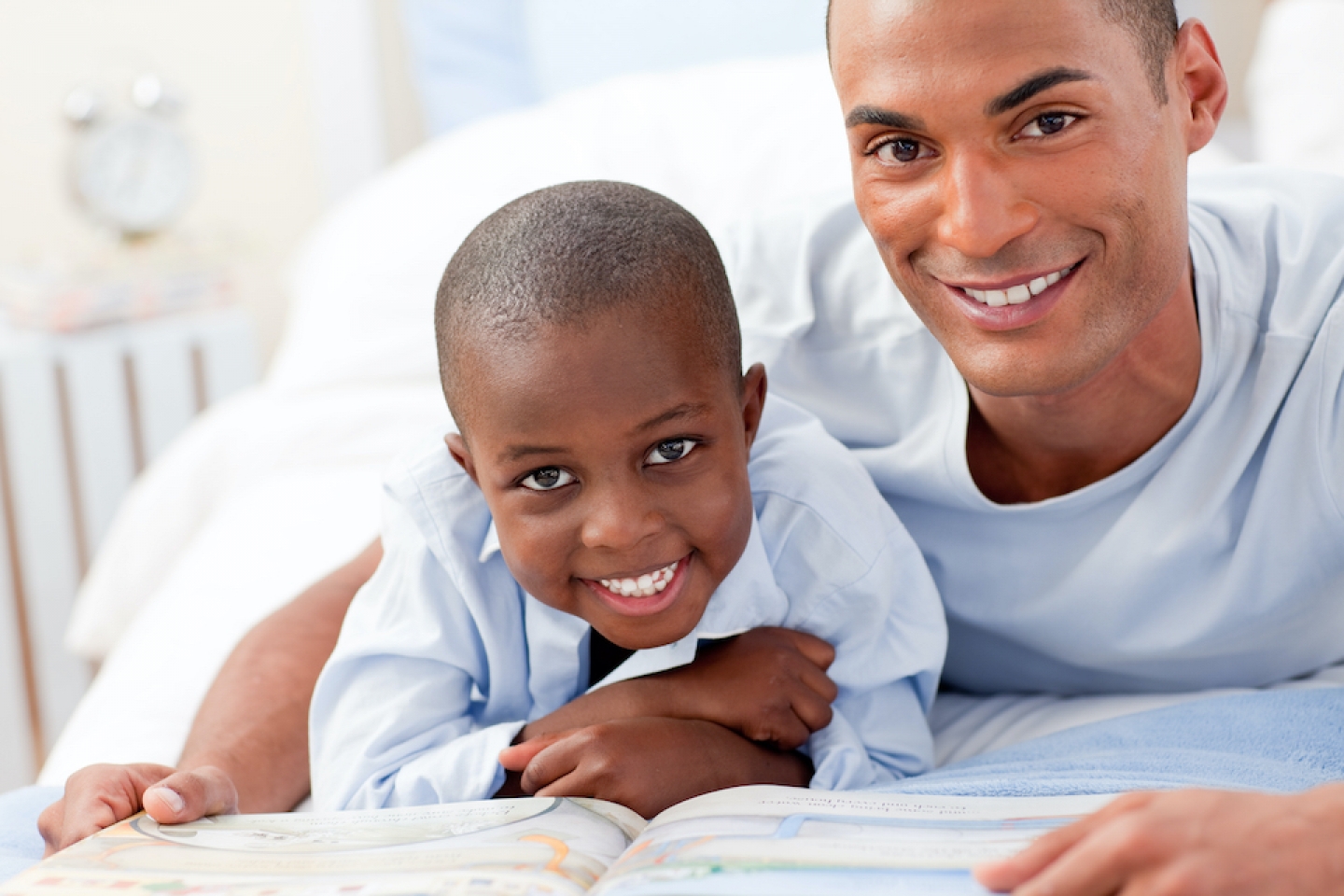 father and son reading