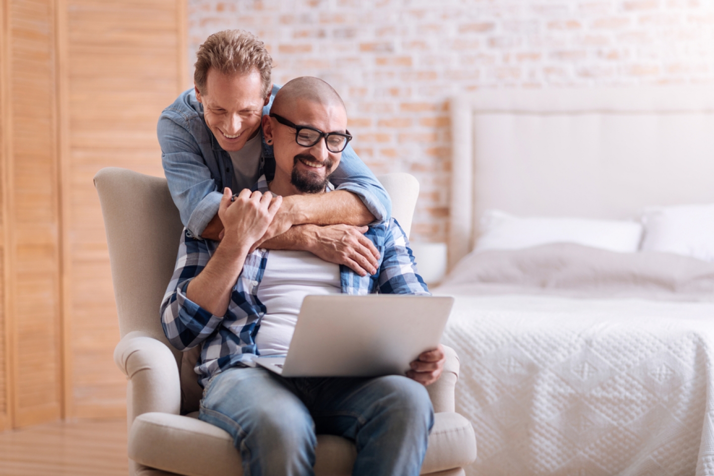 two gay men in an embrace