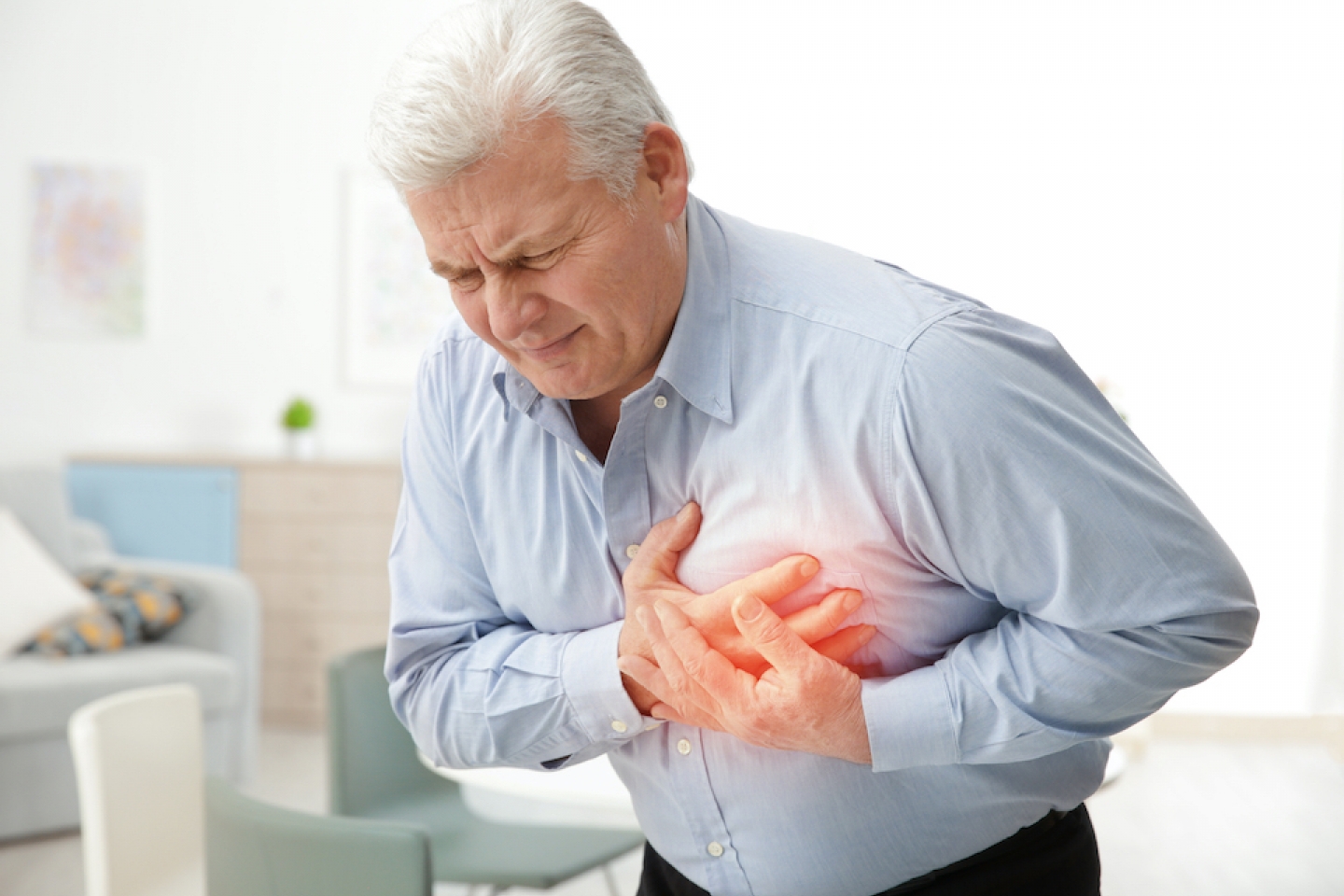 man having heart chest pain