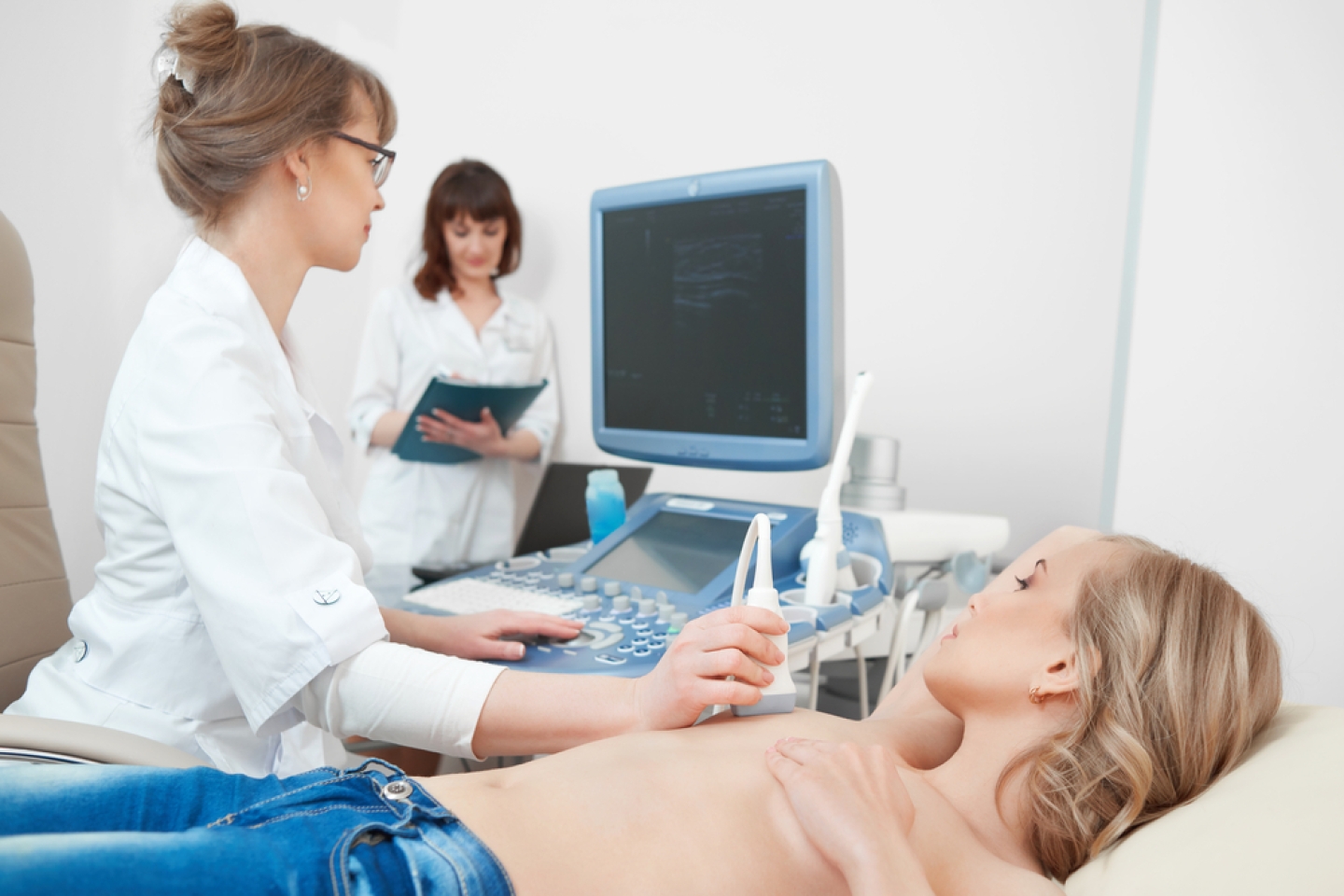 getting breast examination with ultrasound