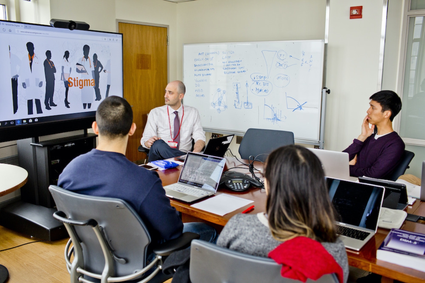  Dr. Avery teaching medical school students about substance use.