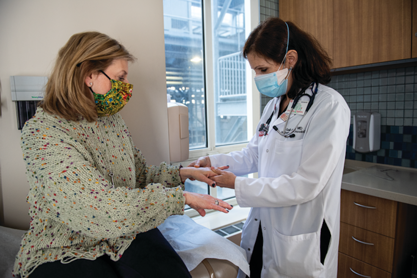 Dr. Gail Roboz (above right), examines patient Cheryl Bonder this spring as part of her ongoing treatment.