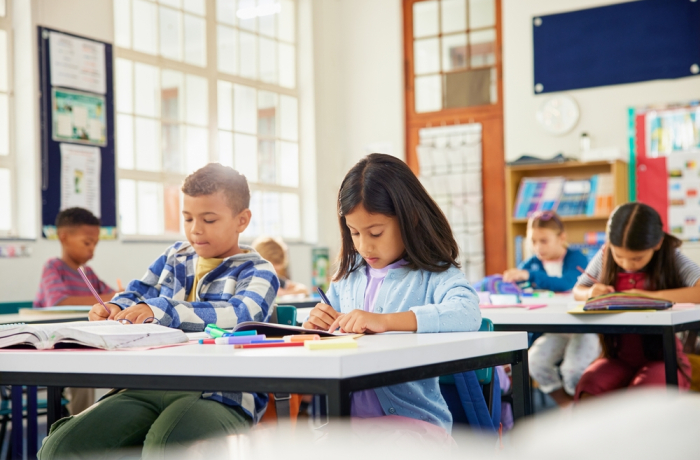 Back to school, kids inside classroom