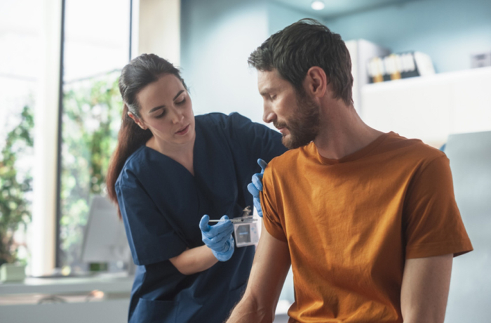 man receiving vaccine
