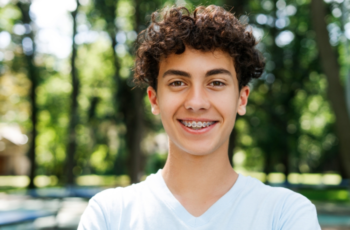 A young boy smiling