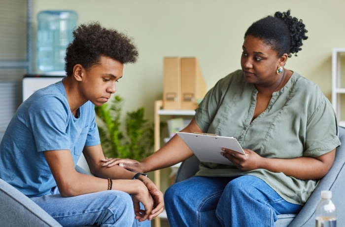 therapist with teen child