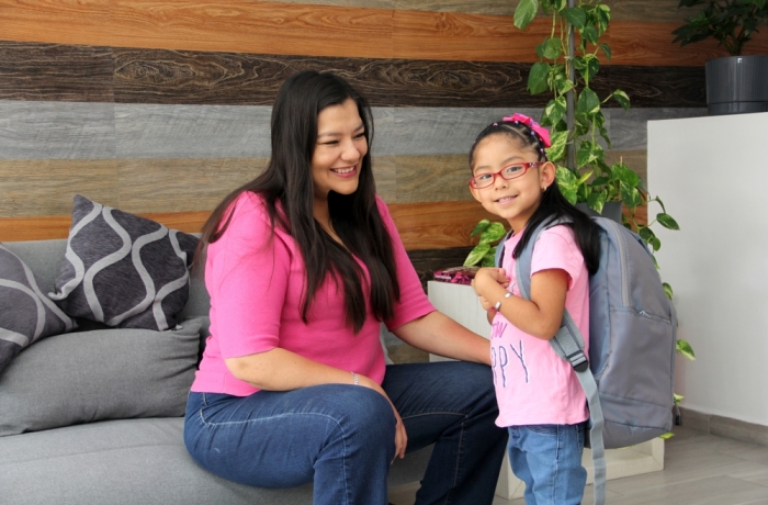 mom and daughter getting ready for school