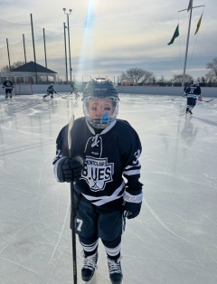 Brayden playing hockey