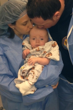 Brayden as a baby with his parents