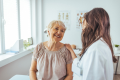 women and doctor talking