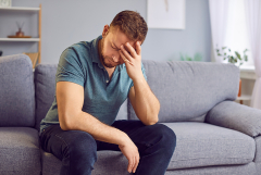 Man sitting on a couch