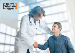 man shakes hand with his doctor