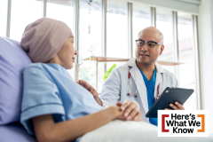 Male doctor visiting female cancer patient with care and compassion in hospital room